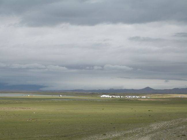  2006:09:03 22:37:58   View toward Lake  and Tibetian tents from Beach Ridge Outcrop - East Side of Lake c.jpg